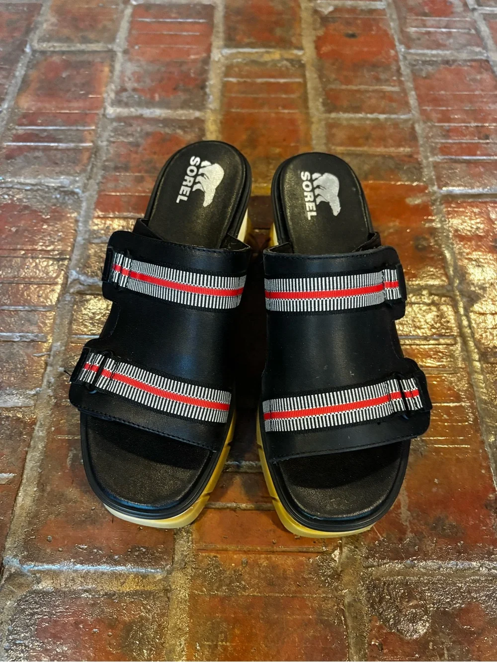 Sorel Black Slide Sandals with Red and White Striped Webbing